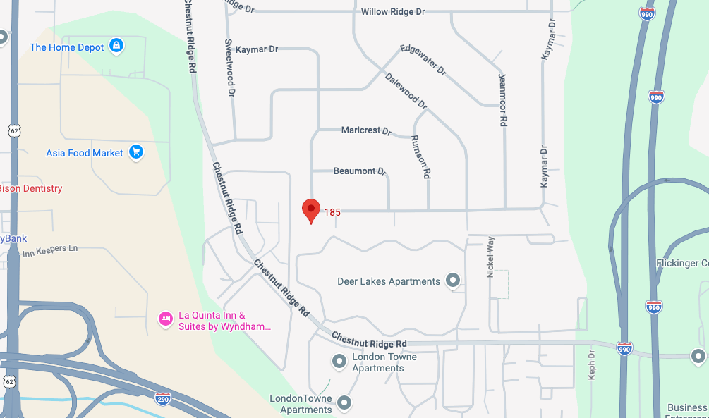 A map shows a red marker in the middle of a neighborhood with various streets and locations labeled.